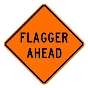 W20-7a Flagger Ahead Sign